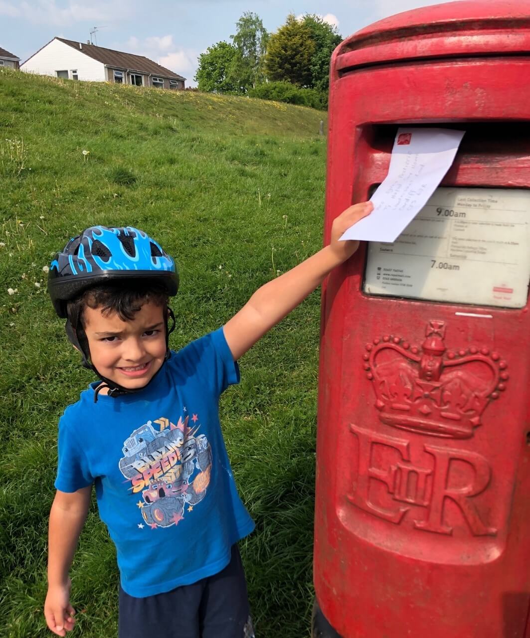 Leo posting letters to care homes